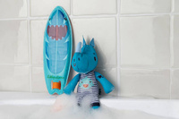 LILLIPUTIENS Magiczna przytulanka do kąpieli surfer Nosorożec Marius 12 m+